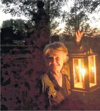  ?? LAWRENCE POWELL/SALTWIRE NETWORK ?? Sally Deveau spends Friday and Saturday evenings in the Round Hill Graveyard leading people on walks back in time. The fascinatin­g tour delves into the history of the area and is more than a little bit spooky.