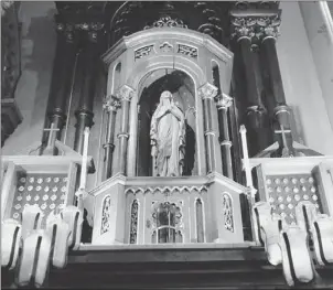  ?? Connor Mulvaney/Post-Gazette photos ?? An altar depicting The Virgin Mary in St. Anthony Chapel, Troy Hill, was carved by Brother Cosmas.