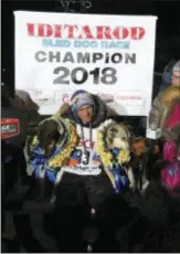  ?? DIANA HAECKER — THE ASSOCIATED PRESS ?? Joar Ulsom of Norway poses with his dogs after winning the Iditarod sled dog race in Nome, Alaska on Wednesday.