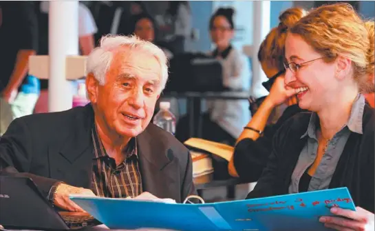  ??  ?? Property developer Harry Triguboff, who has been awarded an honorary doctorate, talks with Dr Juliane Mayer.
Photo: LYNDON MECHIELSEN