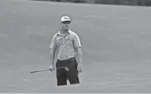  ?? / MILWAUKEE JOURNAL SENTINEL ?? Charley Hoffman watches his chip shot on the second hole during the third round of the U.S. Open on Saturday at Erin Hills.