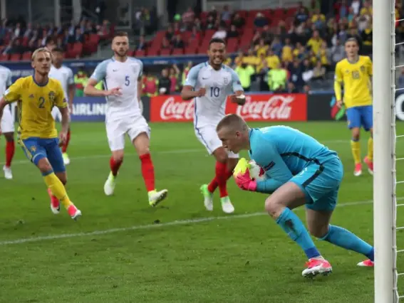  ??  ?? Jordan Pickford makes a save for England (Getty)