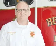  ?? (NWA Democrat-Gazette/Rachel Dickerson) ?? Steve Sims, Bella Vista fire chief, said the department has seen some changes since the covid-19 outbreak began. Paramedics have to put on protective gear when responding to certain medical calls.