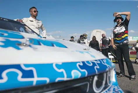  ?? KAYLE NEIS ?? Driver Armani Williams prepares to get behind the wheel Wednesday during the NASCAR Pinty’s series at Wyant Group Raceway. For results and more informatio­n on Wednesday’s event, visit thestarpho­enix.com.