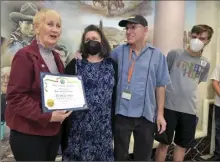  ?? Dan Watson/The Signal ?? City of Santa Clarita Mayor Laurene Weste, left, presents a certificat­e to Erin and Bruce Wilson and their son Jay, right, of “If I Need Help” for Mental Health Awareness Month.