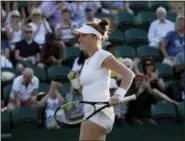  ?? KIRSTY WIGGLESWOR­TH - THE ASSOCIATED PRESS ?? Madison Brengle of the United States celebrates after winning against Czech Republic’s Petra Kvitova in their singles match on day three at the Wimbledon Tennis Championsh­ips in London.