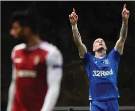  ??  ?? Ryan Kent celebrates after sealing the win for Rangers in Braga