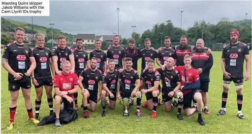  ??  ?? Maesteg Quins skipper Jakob Williams with the Cwm Llynfi 10s trophy