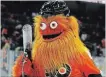  ?? TOM MIHALEK THE ASSOCIATED PRESS ?? The wildly popular new Philadelph­ia Flyers mascot, Gritty, was partially developed by Dave Raymond’s mascot consulting business.