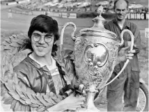  ??  ?? Right: Proudly displaying the Mellano Trophy in 1971, awarded for best performanc­e in the Hutchinson 100, where Williams won both legs of a twopart Production race on a 750cc Norton Commando.