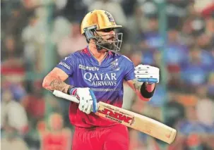  ?? ?? (Left) Virat Kohli during his 77-run innings against Punjab Kings on Monday. (Right) Kohli coming down the track against Kagiso Rabada. Pti/screengrab