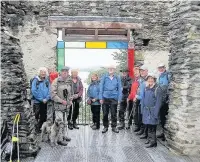  ??  ?? The walkers at Claife viewing station overlookin­g Windermere