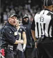  ?? ROBERT GAUTHIER / LOS ANGELES TIMES ?? Saints coach Sean Payton screams at down judge Patrick Turner after no penalty was called when Los Angeles Rams corner Nickell Robey-Coleman hit Saints receiver Tommylee Lewis too early.