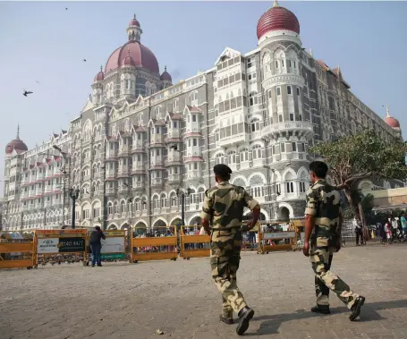  ?? AP ?? Police outside the Taj Mahal Palace hotel yesterday. The hotel was one of the targets of the 2008 Mumbai terrorist attacks