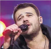  ?? Valery Sharifulin Tass ?? EMIN AGALAROV, who performs as Emin, sings during a 2016 concert in Moscow’s Red Square.