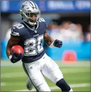  ?? (AP/Kyusung Gong) ?? Dallas running back Tony Pollard ran for 109 yards and a touchdown on Sunday in the Cowboys’ 20-17 victory over the Chargers.