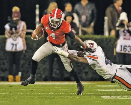  ?? GEORGIA PHOTO/STEVEN LIMENTANI ?? Georgia junior receiver Mecole Hardman had a 32-yard catch during last Saturday night’s 27-10 home win over Auburn, but his biggest play was a 41-yard kickoff return after the Tigers had taken a 10-6 lead midway through the second quarter.