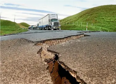  ?? PHOTO: DEREK FLYNN/FAIRFAX NZ ?? Experts predict the most significan­t costs will involve repairing infrastruc­ture, such as cracks in the road.