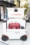  ??  ?? The delivery robots are being tested by Yelp Eat24 to ferry orders from four restaurant­s in San Francisco.