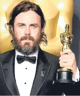  ??  ?? Casey Affleck with his best actor award.