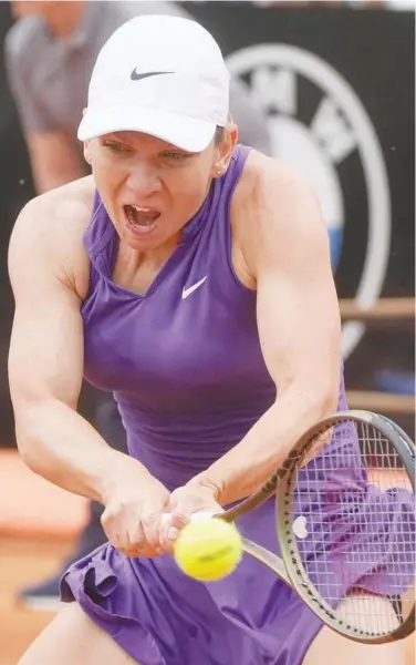  ?? Associated Press ?? Simona Halep plays a return shot against Alize Cornet during their Italian Open match in Rome on Monday.