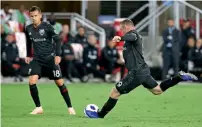  ?? Reuters ?? Wayne Rooney (right) scores a goal against Toronto. —