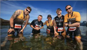  ??  ?? Cooling down….Members of Tralee Triathlon Club, cool down after competing in the Hardman Sprint Triathlon on Valentia Island. from left, Cathal King, John McKeonn, Ines Delgado, Joe Roche and John Roche. Photo:Valerie O’Sullivan