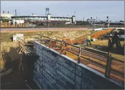  ?? TRIBUNE NEWS SERVICE ?? California High-Speed Rail constructi­on continues on the Tulare Street underpass in Fresno’s Chinatown on Thursday, Dec. 8, 2022.