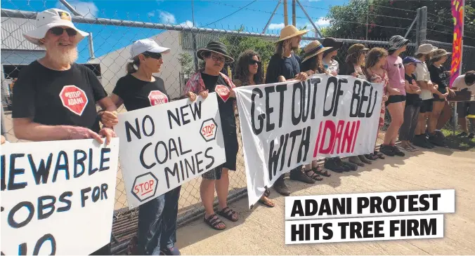  ??  ?? BLOCKING OFF: Anti-adani protesters outside the Eastern Tree Services Garbutt office yesterday.