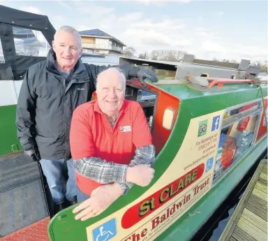  ??  ?? Baldwin Trust chairman and trustee Mick McLoughlan and secretary Alasdair Macintyre aboard St Clare. Picture by Chris Gordon