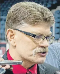  ?? SRM PHOTOGRAPH­Y ?? UNB Varsity Reds head coach Gardiner MacDougall talks to the media after winning the U Sport men’s hockey national championsh­ip in Halifax in March 2016. The Bedeque native was named the Atlantic University Sport men’s hockey coach of the year on...