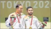  ?? PTI ?? Manish Narwal (right) and Singhraj Adhana celebrate after winning the gold and silver medals in 50m pistol shooting.