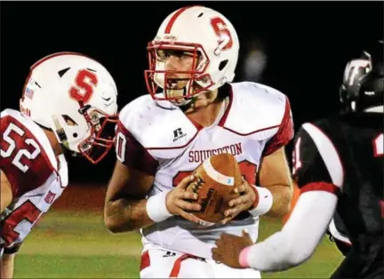  ?? BOB RAINES — DIGITAL FIRST MEDIA ?? Souderton quarterbac­k Joe Curatto looks for a receiver during the Indians game at William Tennent on Oct. 7.