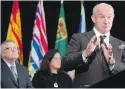  ?? CP ?? Mike Farnworth, B.C.’s minister of public safety, speaks at Friday’s news conference in Vancouver.