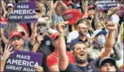  ??  ?? Supporters of President Donald Trump cheer as he appears at his re-election rally at the BOK Center in Tulsa, Oklahoma. REUTERS