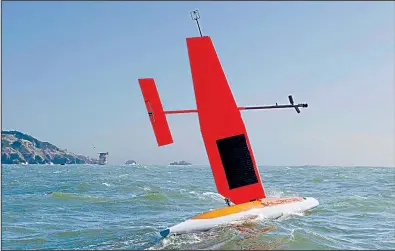  ?? AP ?? An autonomous Saildrone vehicle maneuvers during a data collection mission in the Pacific Ocean off the California coast in April, one of the private-sector projects a Defense Department office is funding.