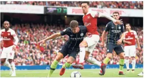  ?? — Reuters ?? Broadcasti­ng rights: Astro has exclusive broadcasti­ng rights to the English Premier League for the next three seasons.