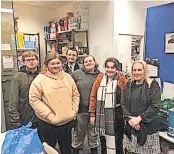  ?? ?? Warmly received Delivering items to the foodbank