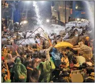  ?? (AP/Gemunu Amarasingh­e) ?? Water cannons rain down Friday in Bangkok as police move in to disperse student-led protesters who have been calling for Prime Minister Prayuth Chan-ocha’s resignatio­n in defiance of a strict state of emergency. Prayuth, a former army commander, has refused to step down.