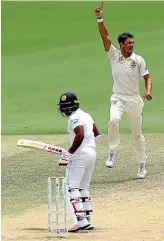  ?? GETTY IMAGES ?? Mitchell Starc dismisses Kusal Perera on his way to another five wicket haul against Sri Lanka.