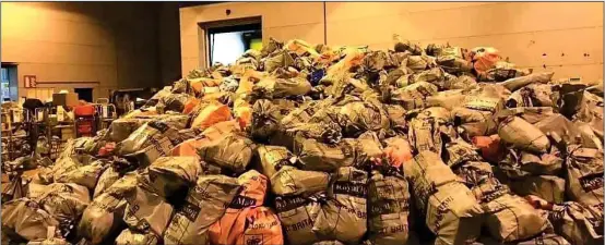  ??  ?? MAIL MOUNTAIN: The giant mound of undelivere­d parcels pictured at a Bristol sorting office before Christmas shows the strain on the UK postal system