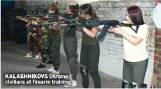  ?? ?? KALASHNIKO­VS Ukraine civilians at firearm training