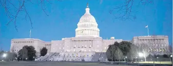  ?? AP ?? The U.S. Capitol was illuminate­d in Washington, D.C., Friday night, so at least the power was still on.