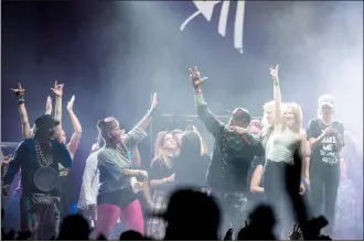  ?? Herald photo by Tijana Martin ?? Vanilla Ice performs on stage with some of his fans during the I Love the ’90’s tour at the Enmax Centre on Thursday night.