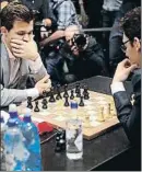  ?? MATT DUNHAM / AP ?? Carlsen y Caruana, ayer