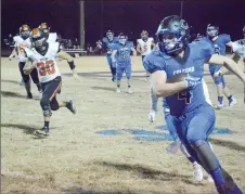  ?? Graham Thomas/Siloam Sunday ?? Colcord running back Trey Duncan runs for a 37-yard touchdown after catching a short swing pass from Stormy Odle during the Hornets’ 41-18 victory over Konawa in the second round of the Oklahoma Class A playoffs