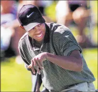  ?? Review-journal file ?? VICTORY Tiger Woods earns first PGA Tour win at Las Vegas Invitation­al at TPC Summerlin