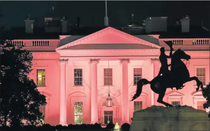  ?? Picture: AFP ?? THINK PINK: The White House is illuminate­d in pink for last year’s Breast Cancer Awareness Month, in Washington, DC. The majority of women with a common form of breast cancer may be able to skip chemothera­py after surgery, based on their score on a...