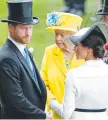  ??  ?? Prince Harry, the Queen and Meghan Markle.