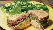  ?? LINDA GASSENHEIM­ER / TNS ?? Toasted Turkey and Cranberry Sandwich withGreen Bean Salad.